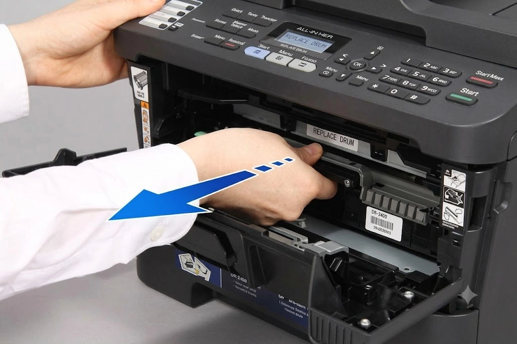 Tháo cụm trống (drum unit) khỏi máy in laser Brother