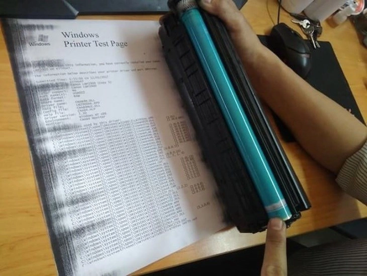 Nguyên nhân và cách khắc phục máy in bị lem mực